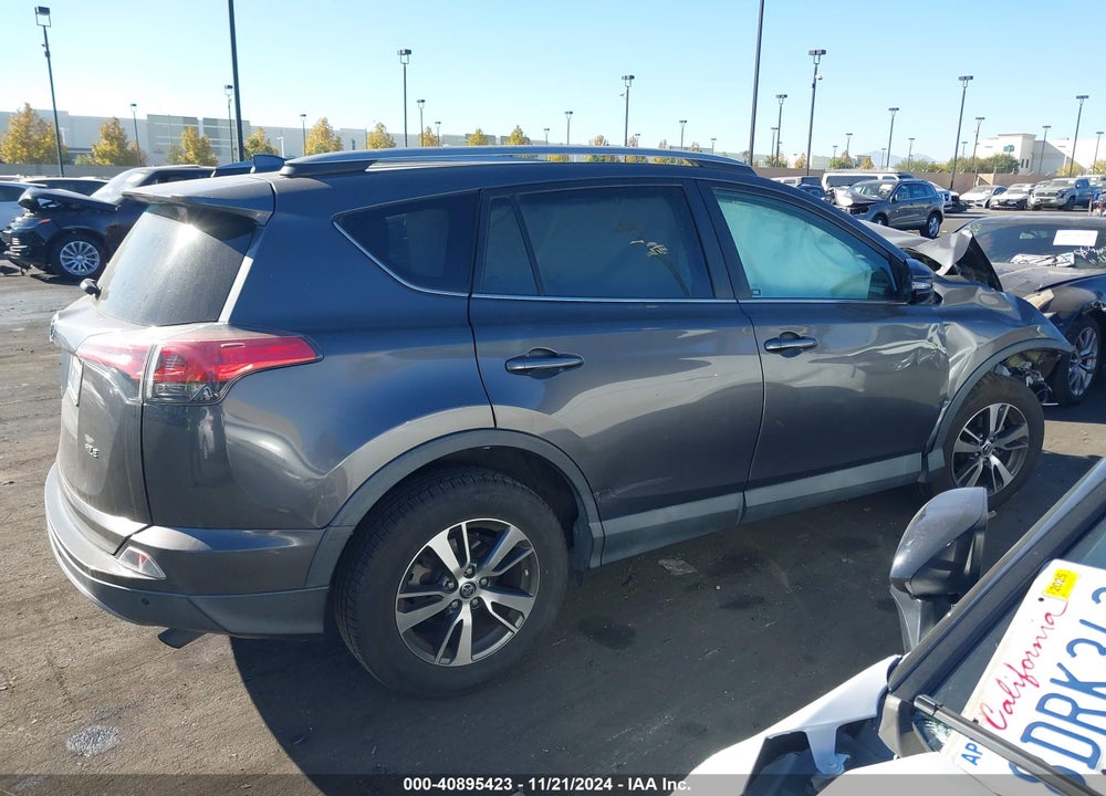 2018 TOYOTA RAV4 ADVENTURE/XLE VIN: 2T3WFREV1JW497140