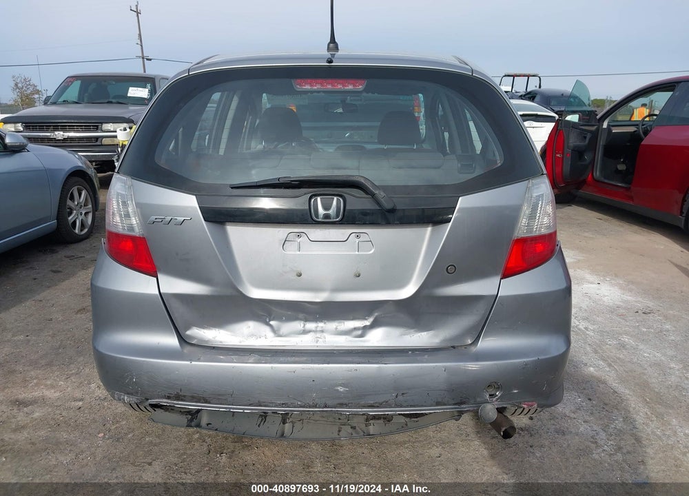 2010 HONDA FIT VIN: JHMGE8H25AC013510