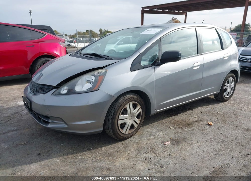 2010 HONDA FIT VIN: JHMGE8H25AC013510