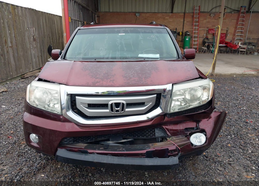 2011 HONDA PILOT EX-L VIN: 5FNYF4H7XBB091972