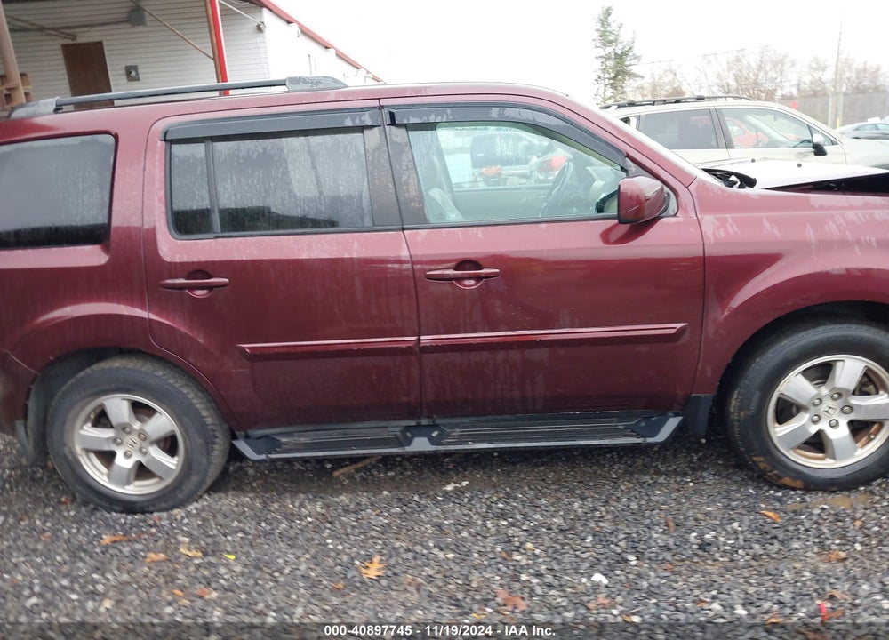 2011 HONDA PILOT EX-L VIN: 5FNYF4H7XBB091972