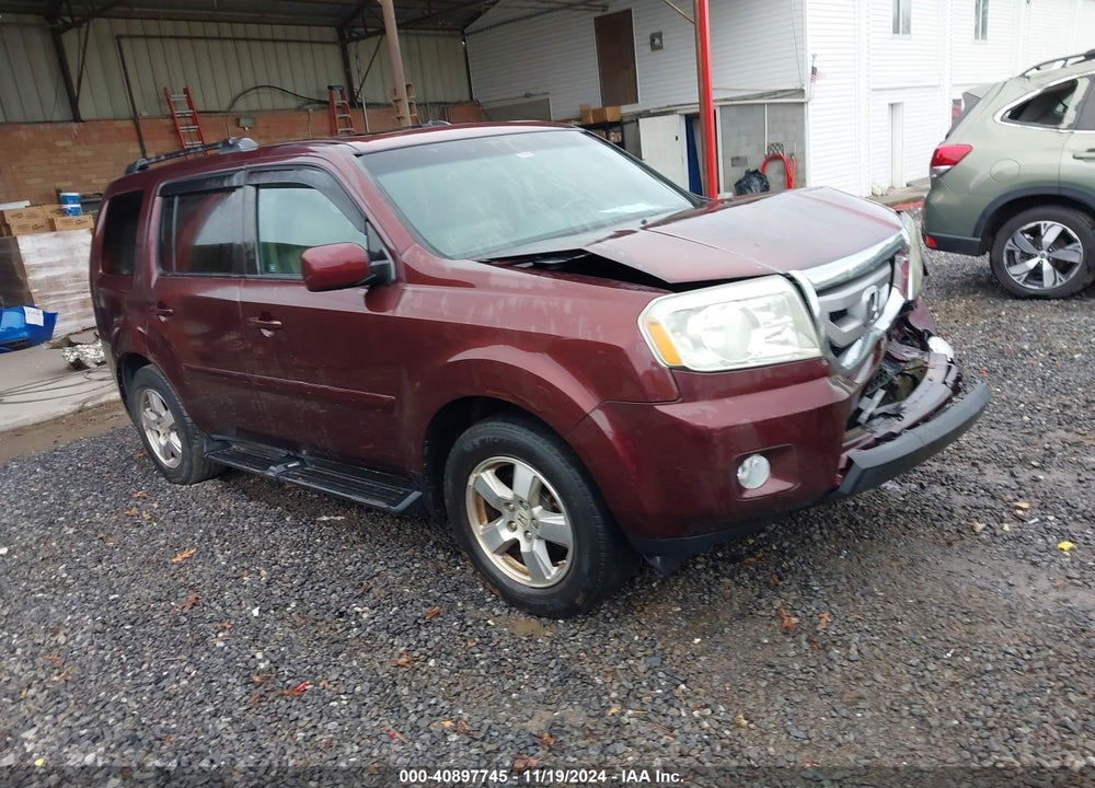 2011 HONDA PILOT EX-L VIN: 5FNYF4H7XBB091972