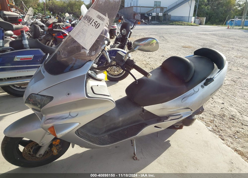 2005 HONDA NSS250 S VIN: JH2MF06755K100635