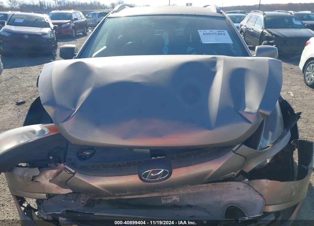 2011 HYUNDAI TUCSON GLS VIN: KM8JUCACXBU242210