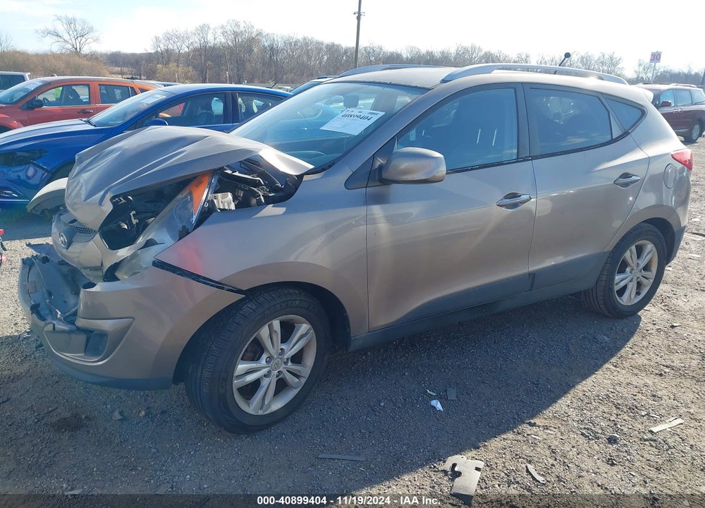 2011 HYUNDAI TUCSON GLS VIN: KM8JUCACXBU242210