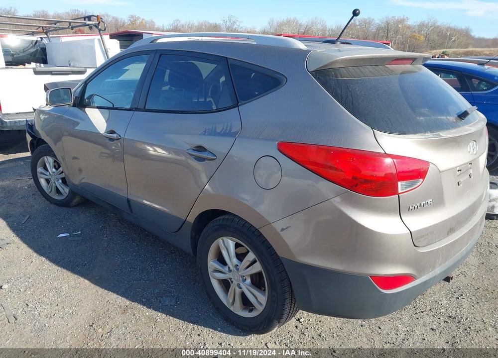 2011 HYUNDAI TUCSON GLS VIN: KM8JUCACXBU242210