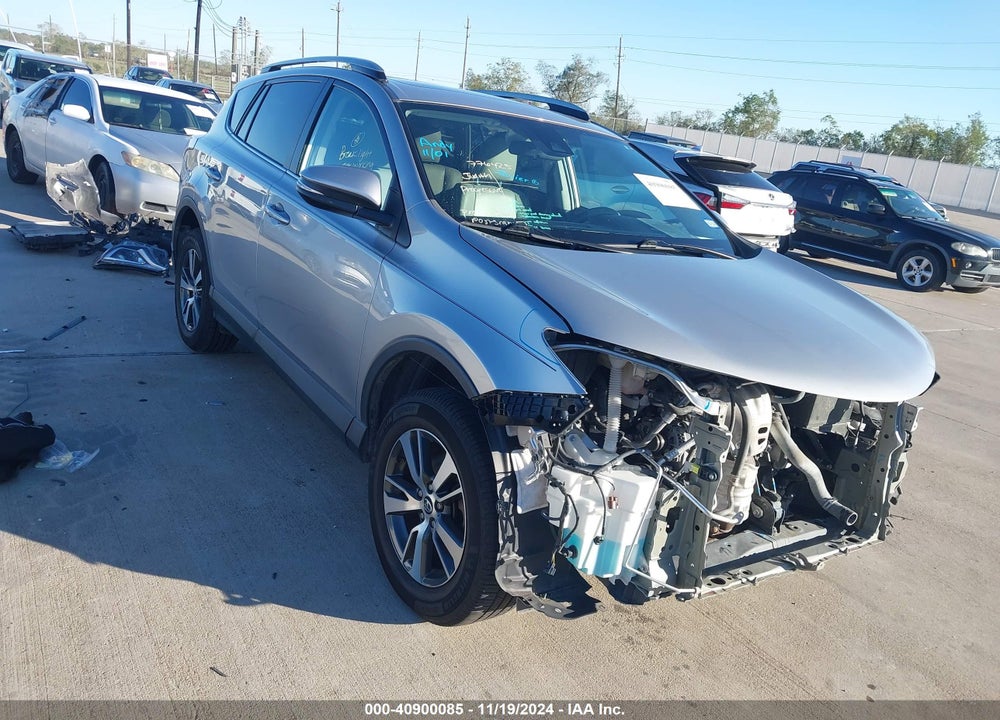 2018 TOYOTA RAV4 ADVENTURE/XLE VIN: 2T3WFREV1JW425497