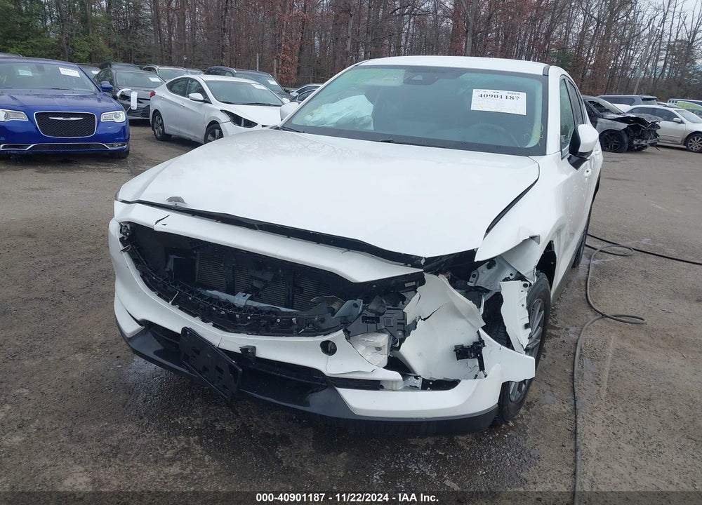 2021 MAZDA CX-5 TOURING VIN: JM3KFBCM4M0335339