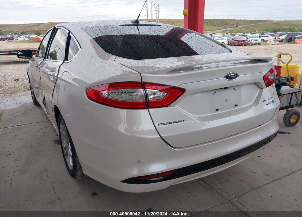 2016 FORD FUSION HYBRID TITANIUM VIN: 3FA6P0RU8GR184034