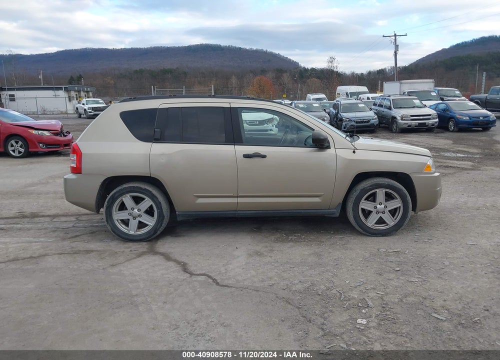 2009 JEEP COMPASS SPORT VIN: 1J4FF47B79D138125