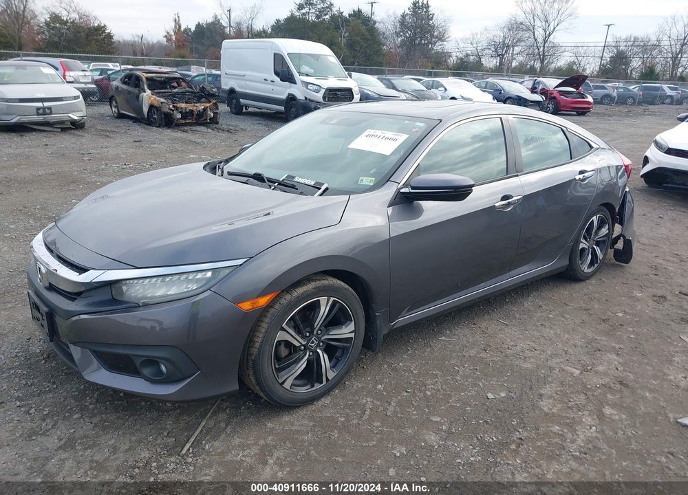 2017 HONDA CIVIC TOURING VIN: 2HGFC1F97HH635240