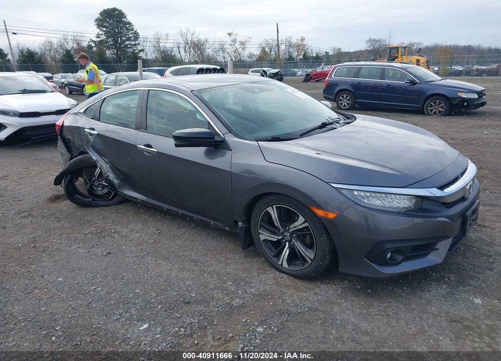 2017 HONDA CIVIC TOURING VIN: 2HGFC1F97HH635240