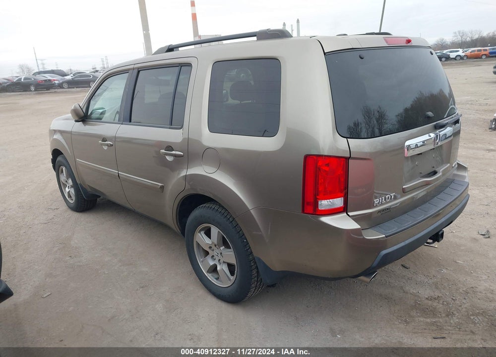 2011 HONDA PILOT EX-L VIN: 5FNYF4H54BB051028