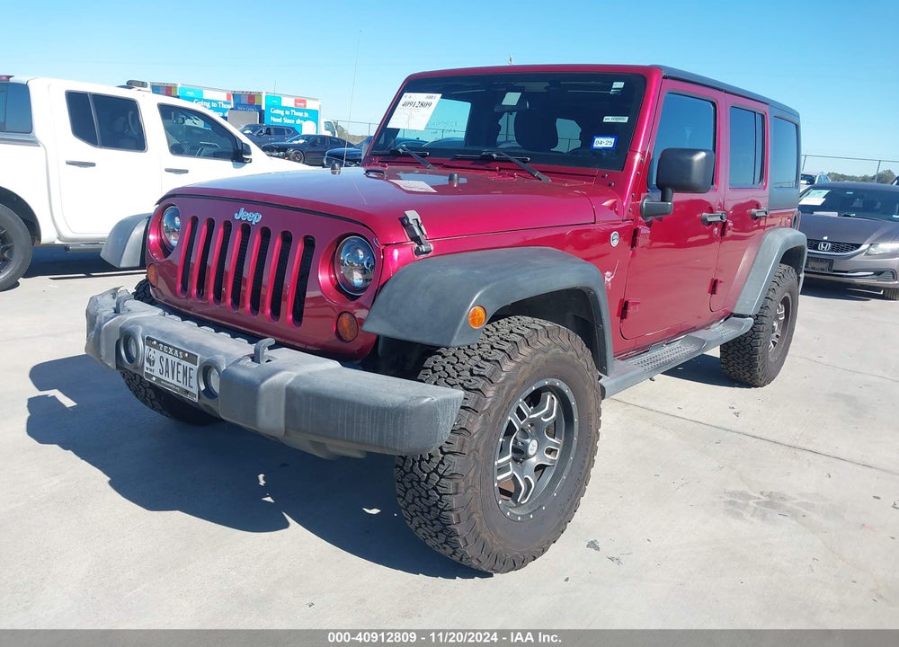 2012 JEEP WRANGLER UNLIMITED SPORT VIN: 1C4BJWDG1CL203448