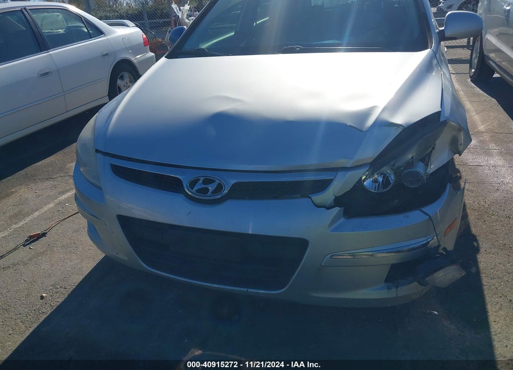 2009 HYUNDAI ELANTRA TOURING VIN: KMHDC86E19U041491