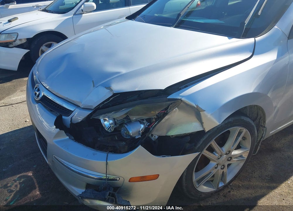 2009 HYUNDAI ELANTRA TOURING VIN: KMHDC86E19U041491