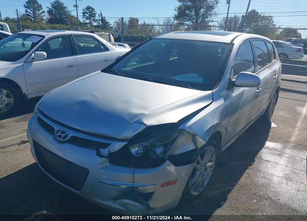 2009 HYUNDAI ELANTRA TOURING VIN: KMHDC86E19U041491