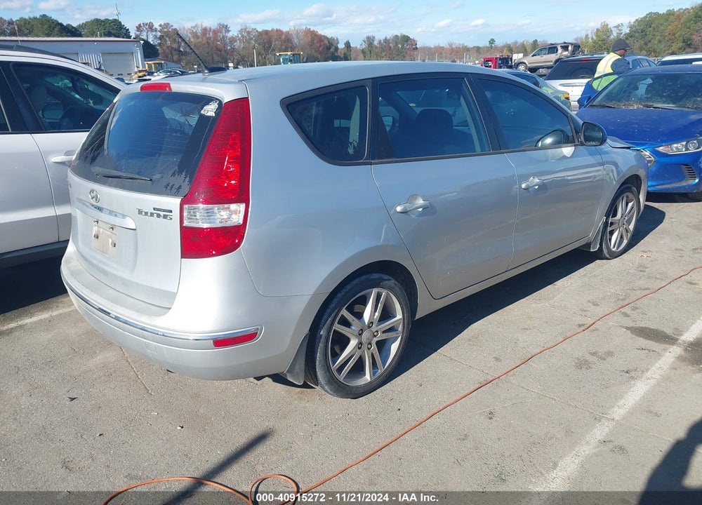 2009 HYUNDAI ELANTRA TOURING VIN: KMHDC86E19U041491