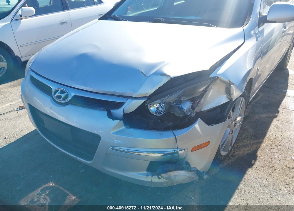 2009 HYUNDAI ELANTRA TOURING VIN: KMHDC86E19U041491