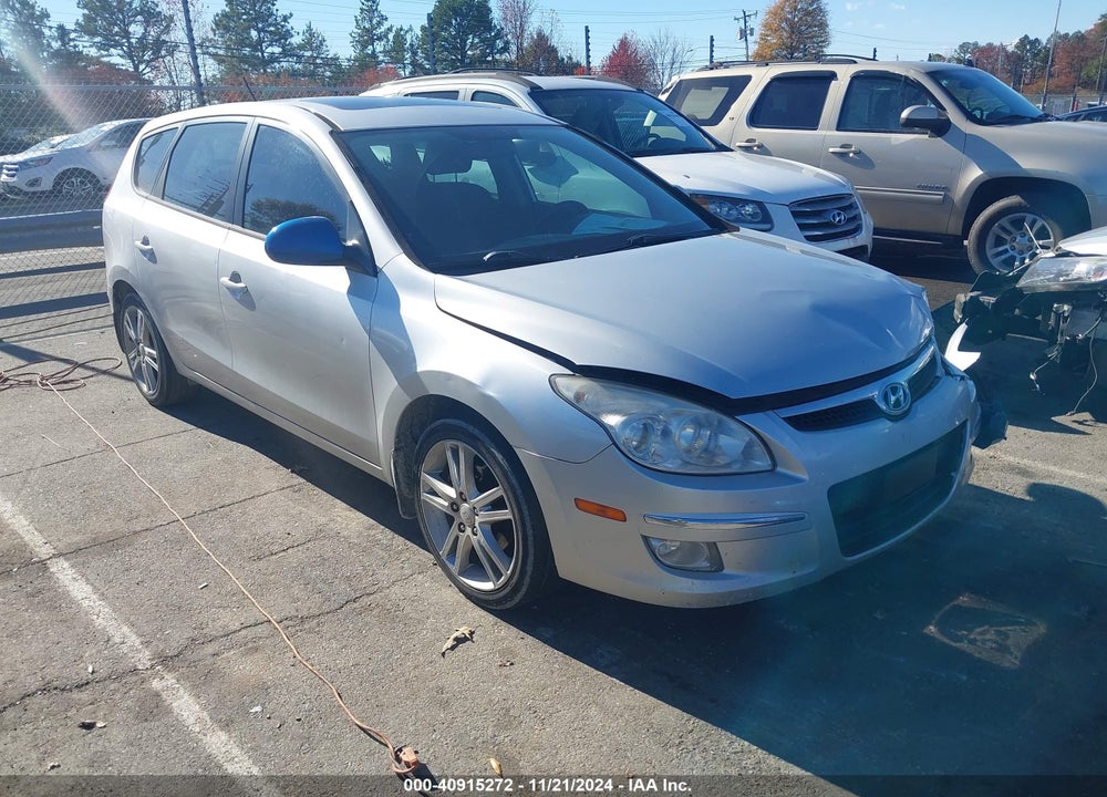 2009 HYUNDAI ELANTRA TOURING VIN: KMHDC86E19U041491