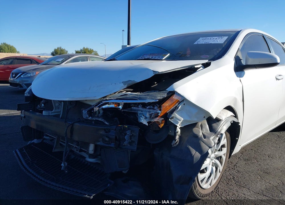2018 TOYOTA COROLLA LE VIN: 5YFBURHE5JP852191