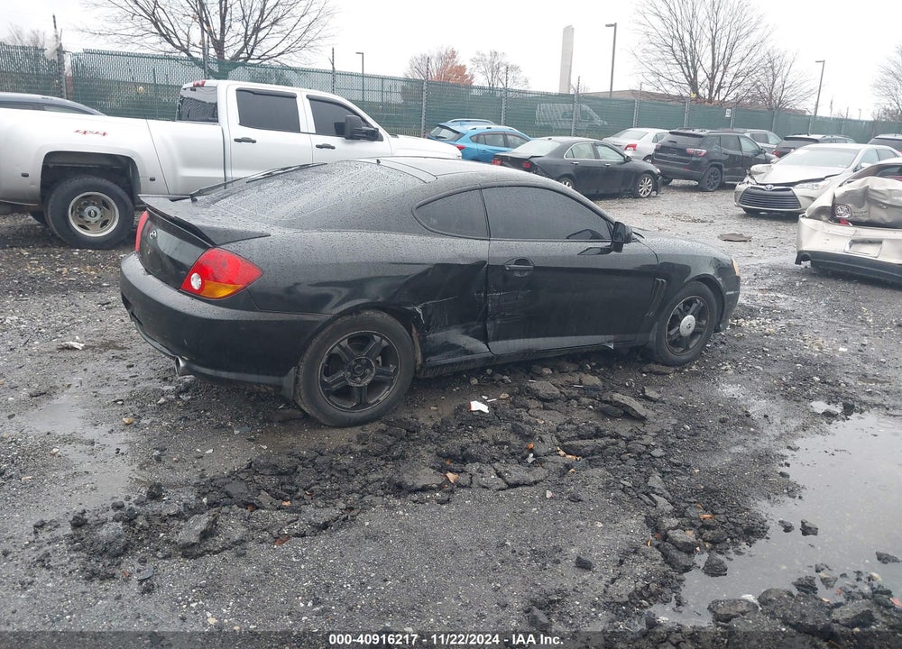 2003 HYUNDAI TIBURON VIN: KMHHM65DX3U060916