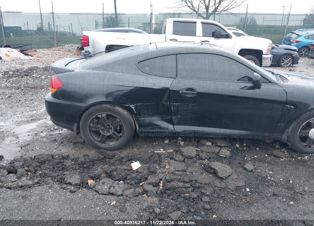 2003 HYUNDAI TIBURON VIN: KMHHM65DX3U060916