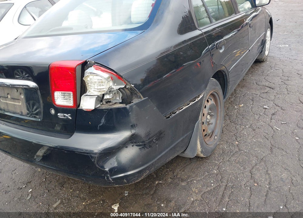 2003 HONDA CIVIC EX VIN: 1HGES26723L010730
