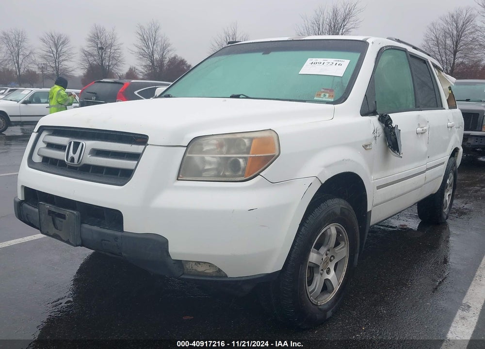 2007 HONDA PILOT EX-L VIN: 5FNYF18597B009640