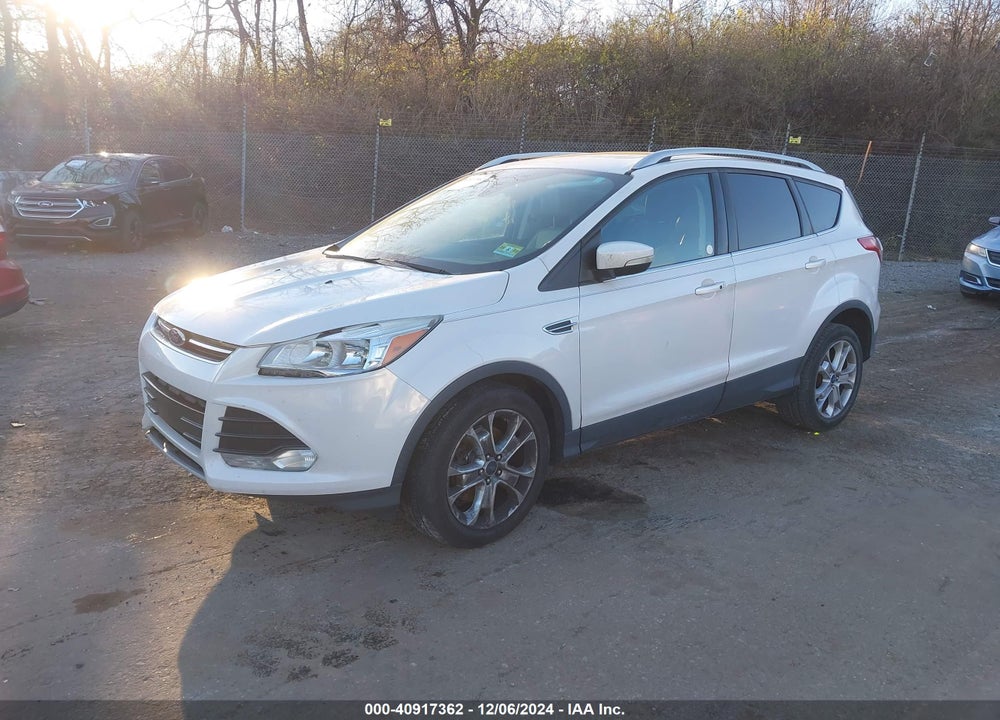 2016 FORD ESCAPE TITANIUM VIN: 1FMCU9JX2GUA16751