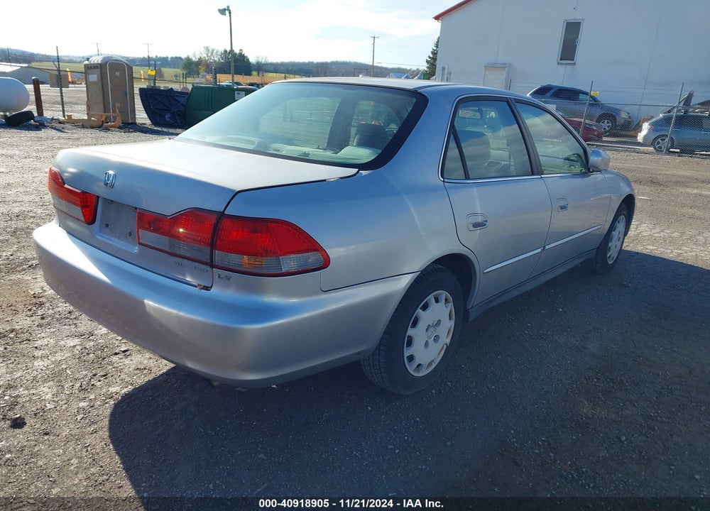 2002 HONDA ACCORD 2.3 LX VIN: 1HGCG66502A021864