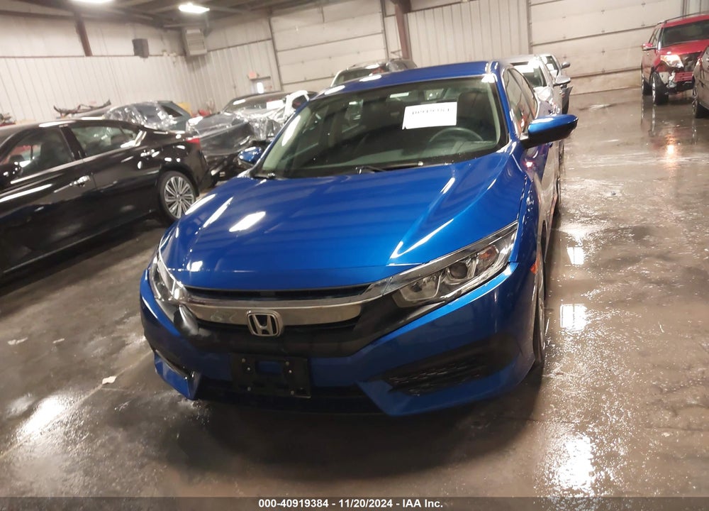 2016 HONDA CIVIC LX VIN: 19XFC2F54GE028210