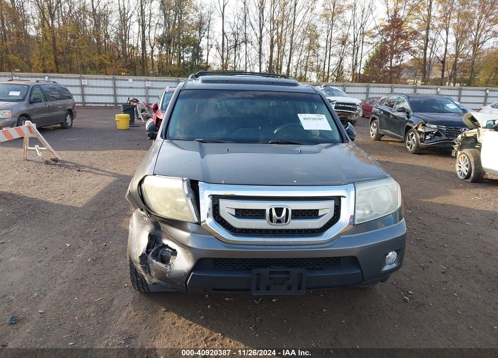 2011 HONDA PILOT TOURING VIN: 5FNYF4H97BB086102