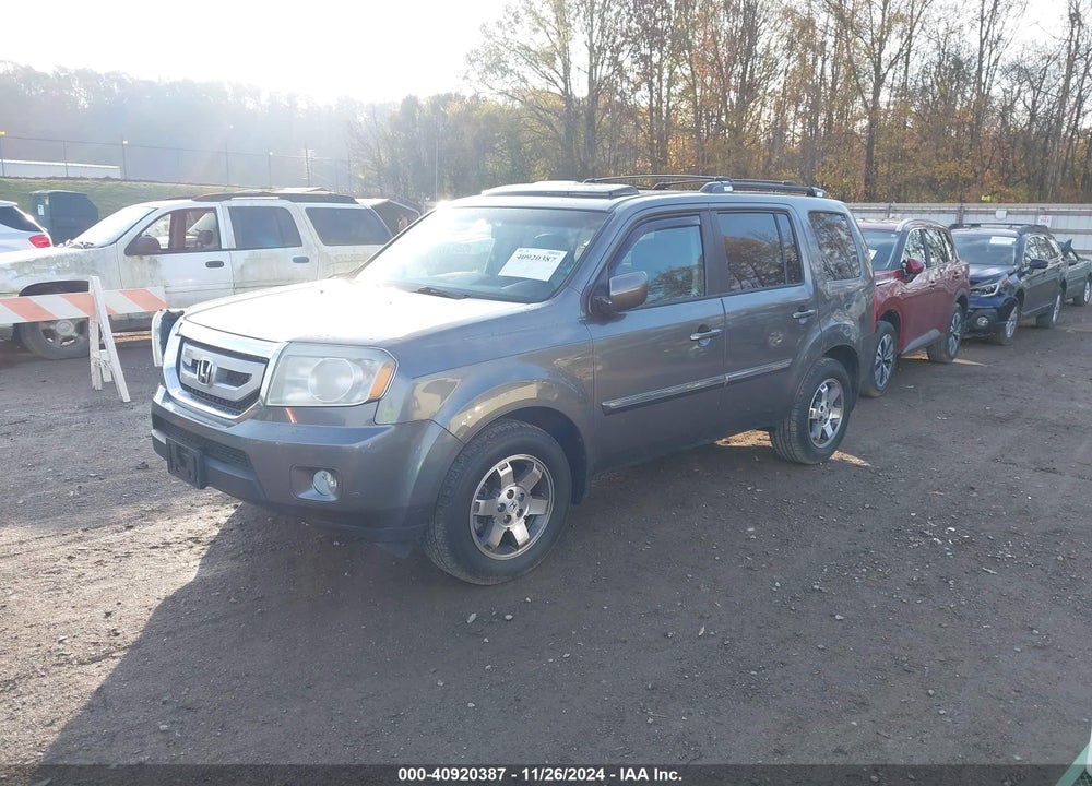 2011 HONDA PILOT TOURING VIN: 5FNYF4H97BB086102