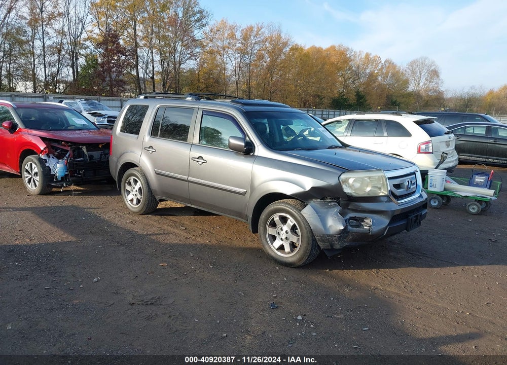 2011 HONDA PILOT TOURING VIN: 5FNYF4H97BB086102