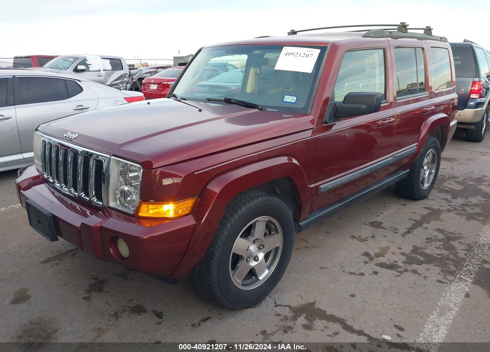 2009 JEEP COMMANDER SPORT VIN: 1J8HH48K49C500594