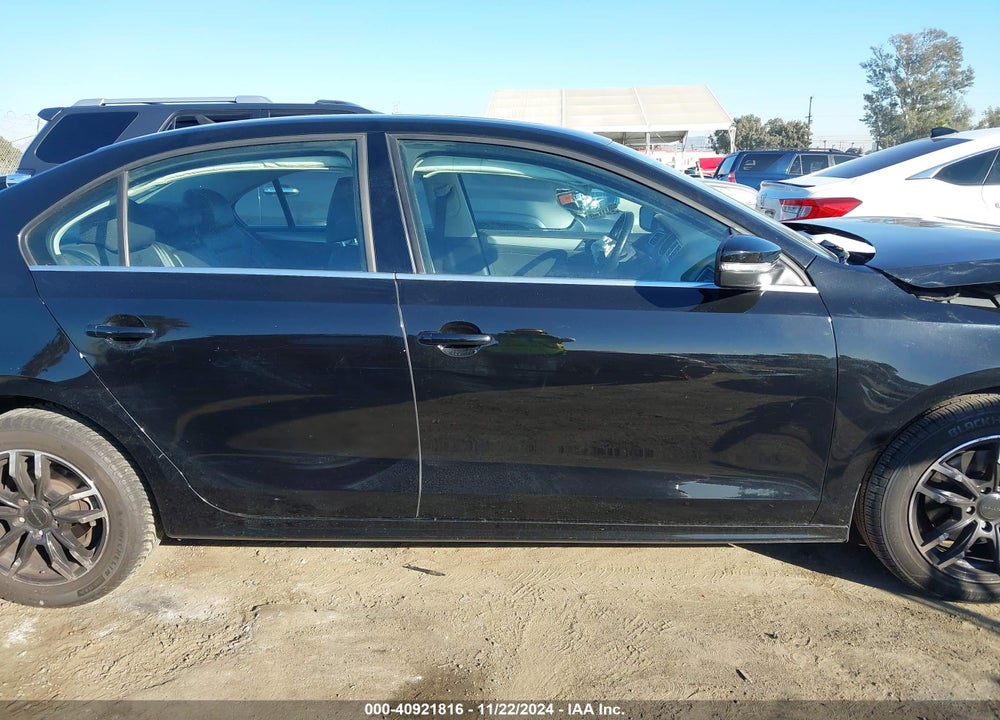 2015 VOLKSWAGEN JETTA 1.8T SE VIN: 3VWD17AJ9FM253920