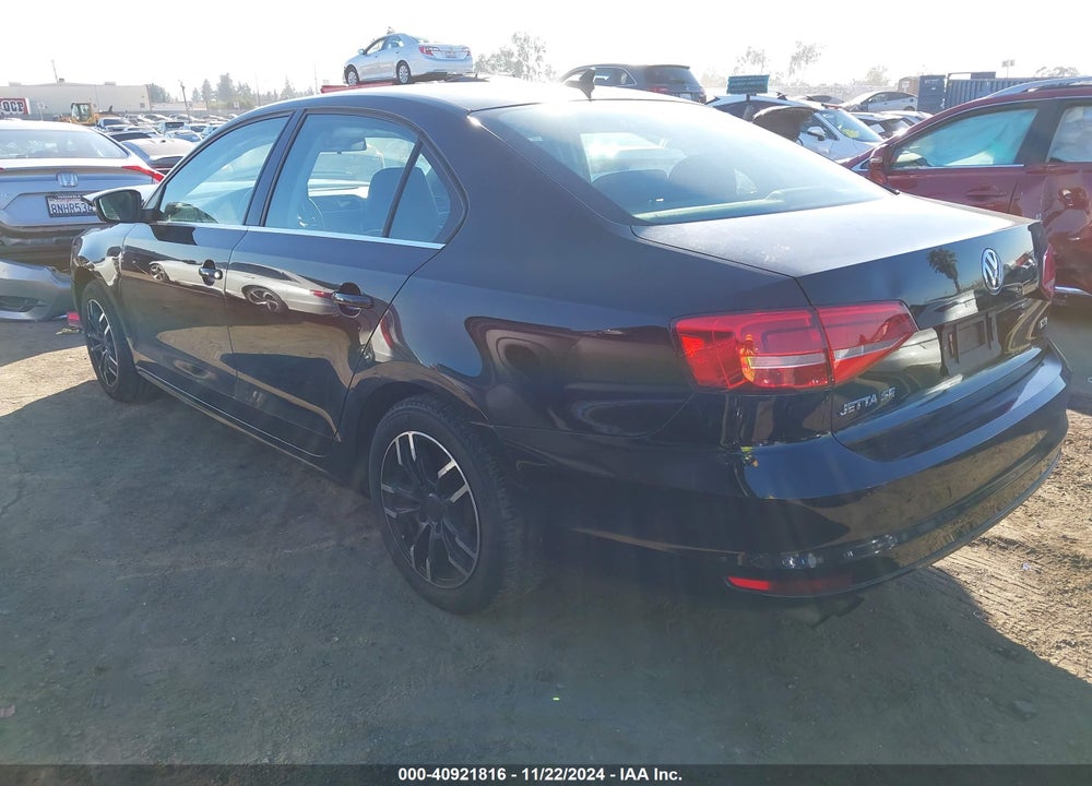 2015 VOLKSWAGEN JETTA 1.8T SE VIN: 3VWD17AJ9FM253920