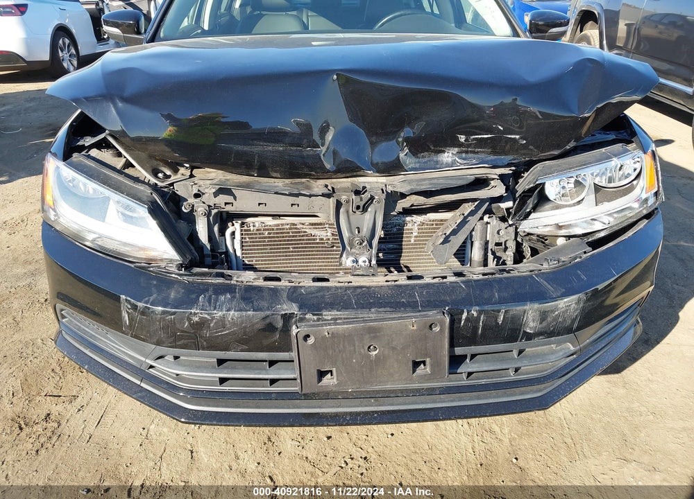 2015 VOLKSWAGEN JETTA 1.8T SE VIN: 3VWD17AJ9FM253920