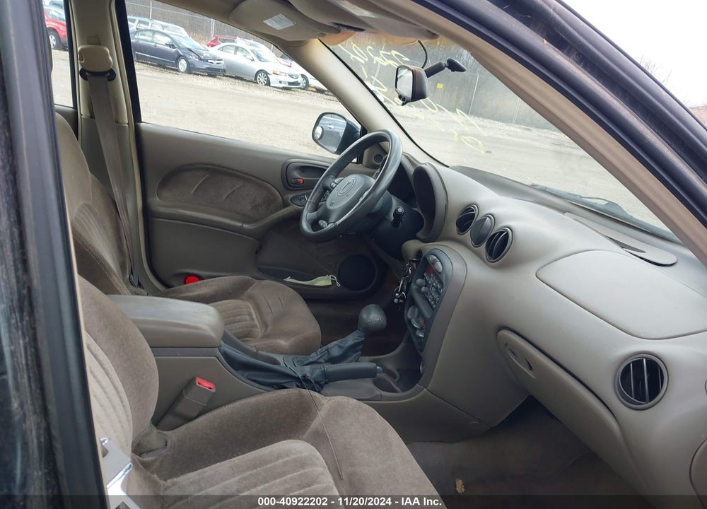 1999 PONTIAC GRAND AM GT1 VIN: 1G2NW52E4XM938603
