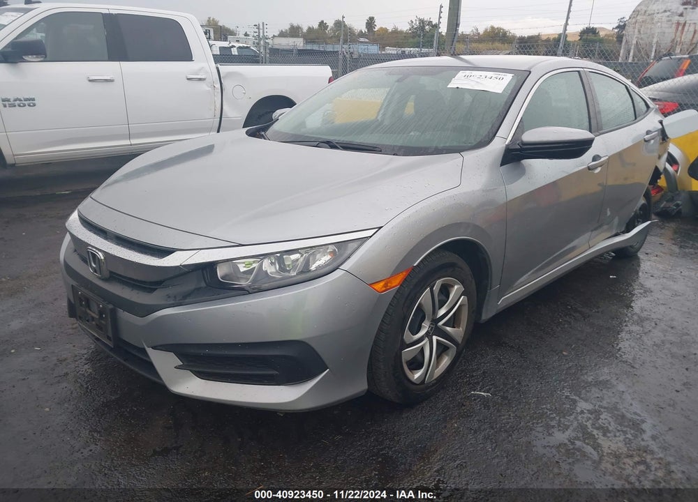 2018 HONDA CIVIC LX VIN: 19XFC2E54JE037885