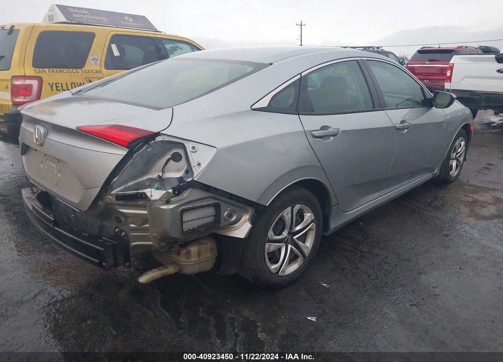 2018 HONDA CIVIC LX VIN: 19XFC2E54JE037885