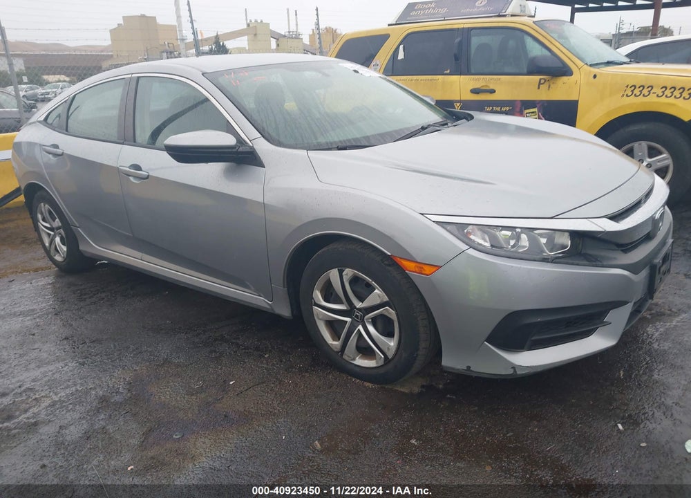 2018 HONDA CIVIC LX VIN: 19XFC2E54JE037885