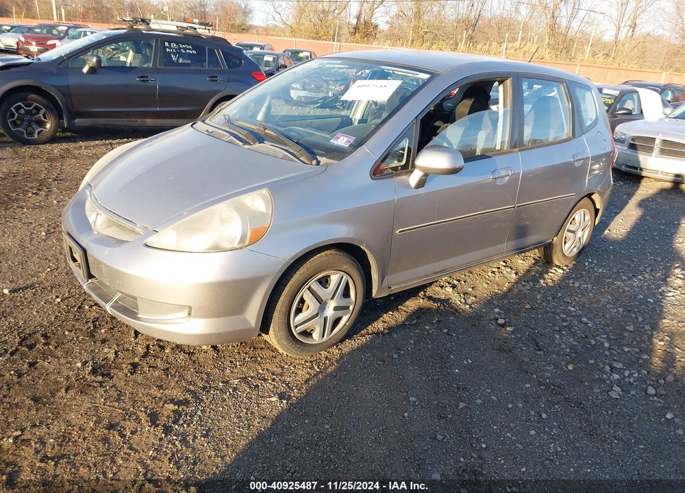 2007 HONDA FIT VIN: JHMGD38457S025467