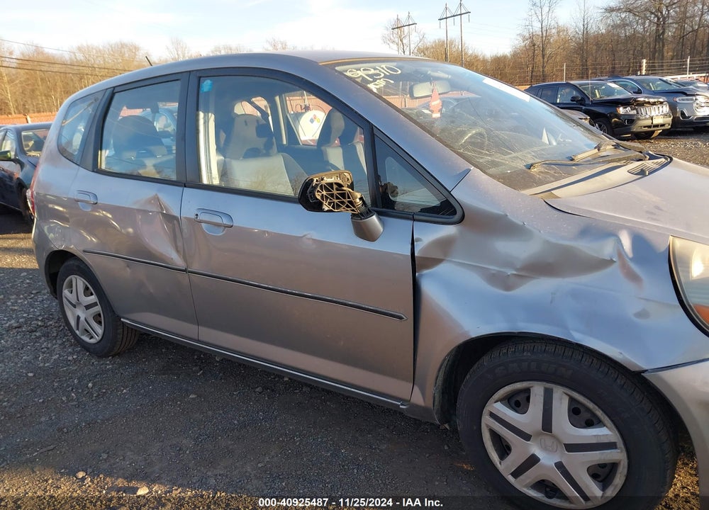 2007 HONDA FIT VIN: JHMGD38457S025467