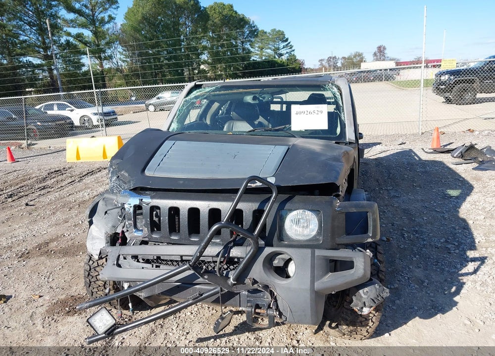 2009 HUMMER H3T VIN: 5GNEN13E198143199