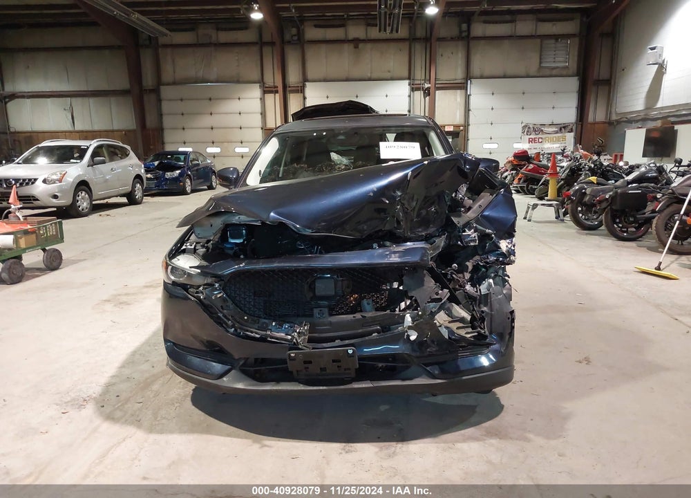 2021 MAZDA CX-5 TOURING VIN: JM3KFBCM5M1371244