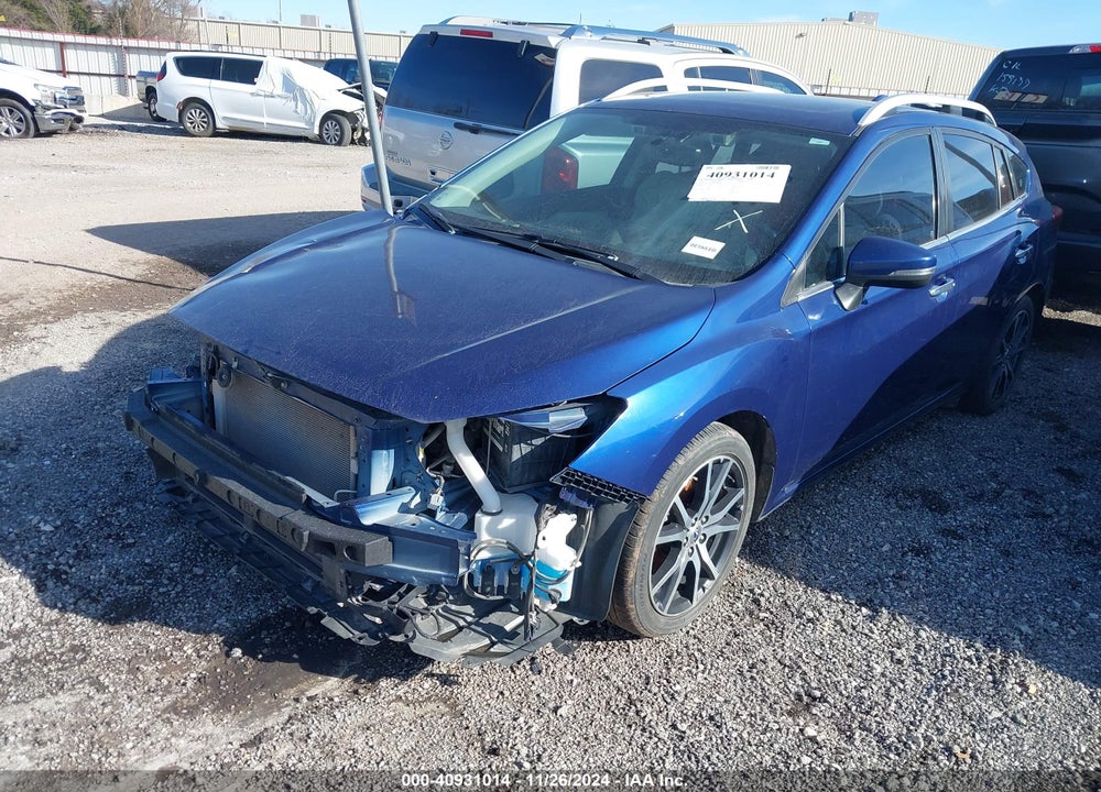 2017 SUBARU IMPREZA VIN: 4S3GTAU61H3748390