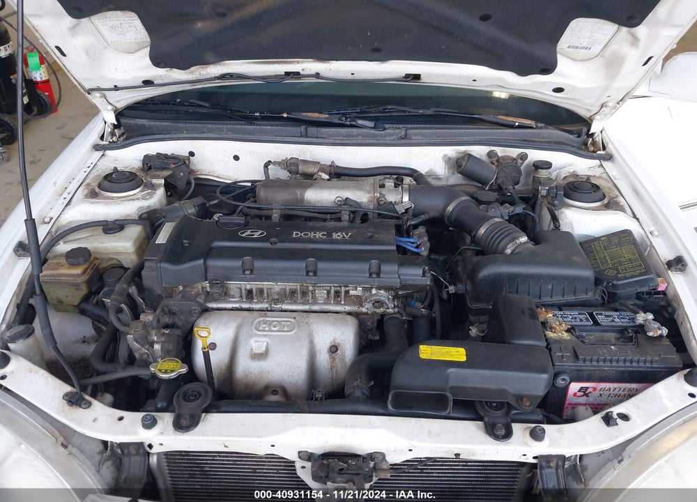 2000 HYUNDAI ELANTRA GLS VIN: KMHJF35F7YU054638