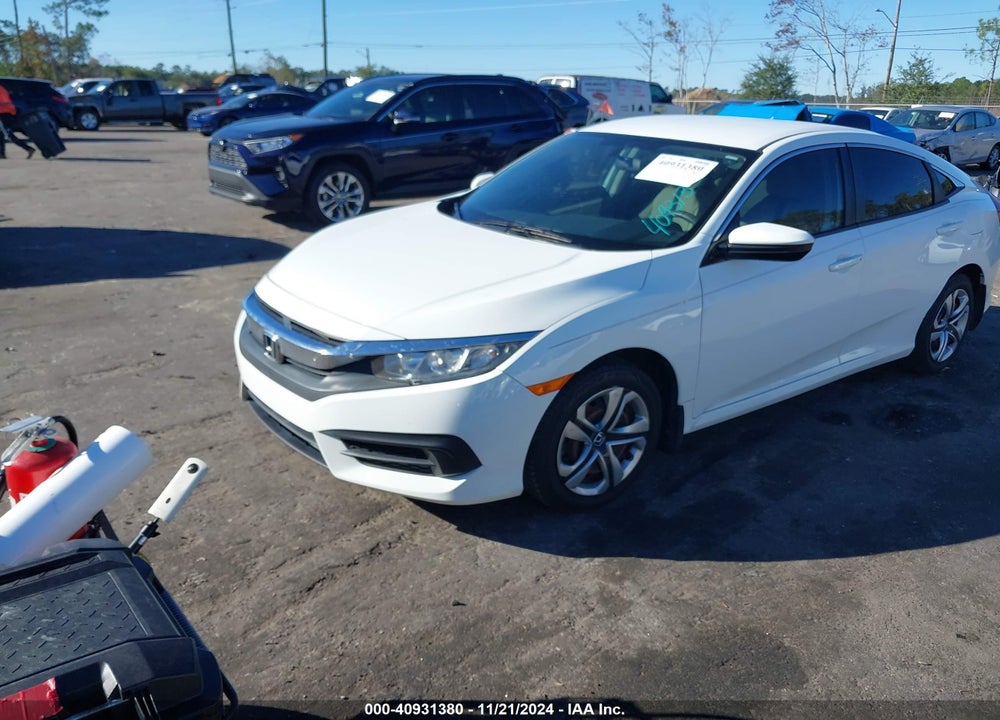 2018 HONDA CIVIC LX VIN: 19XFC2F50JE008303